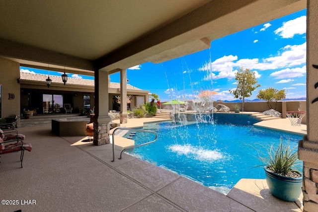 view of swimming pool featuring fence, a fenced in pool, and a patio