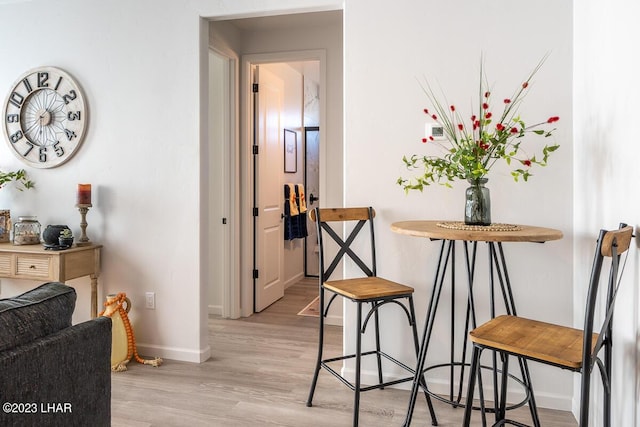 dining space featuring light hardwood / wood-style floors