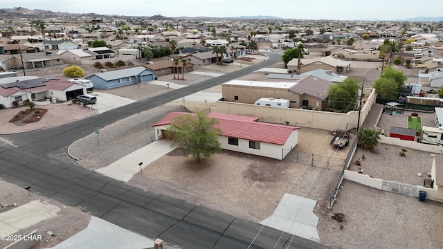 birds eye view of property with a residential view and a mountain view