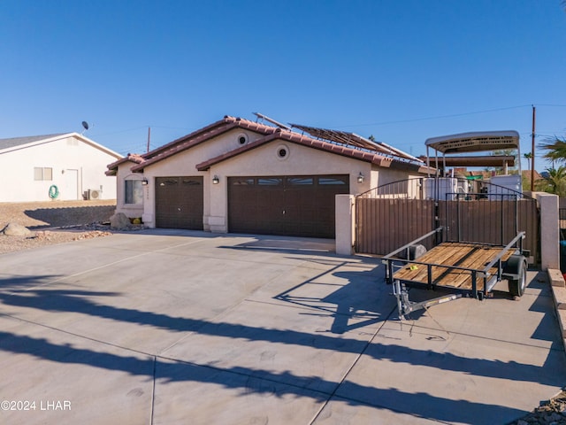 view of front of home with a garage