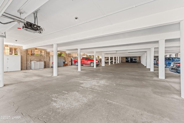 2094 Mesquite Ave Unit 113, Lake Havasu City, AZ 86403 - parking deck featuring a garage door opener