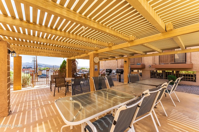 2094 Mesquite Ave Unit 113, Lake Havasu City, AZ 86403 - view of patio with outdoor dining space and a pergola