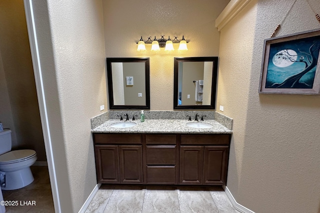 2969 Pony Cir, Lake Havasu City, AZ 86406 - bathroom featuring double vanity and a textured wall