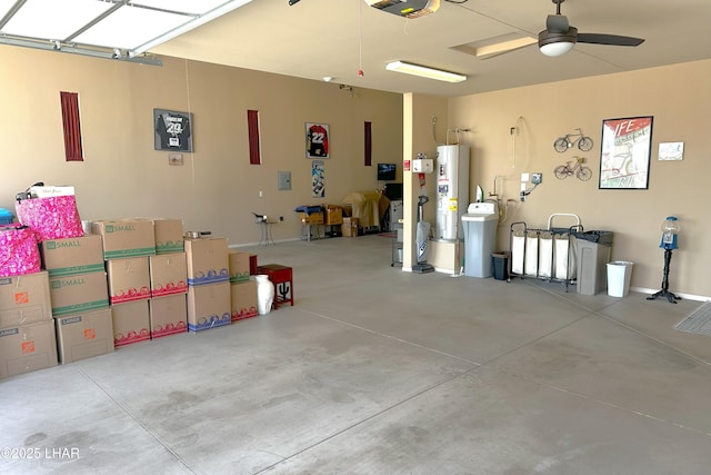2969 Pony Cir, Lake Havasu City, AZ 86406 - garage featuring electric water heater, a garage door opener, and a ceiling fan