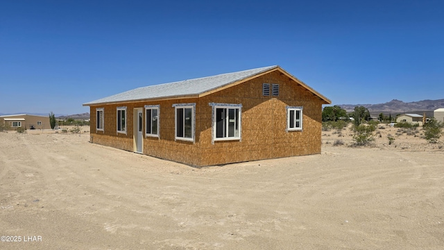16457 S Lynn Ave, Yucca, AZ 86438 - view of side of home with a mountain view