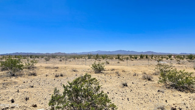 16457 S Lynn Ave, Yucca, AZ 86438 - view of mountain backdrop with a desert landscape and rural landscape