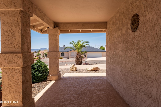view of patio / terrace featuring a mountain view