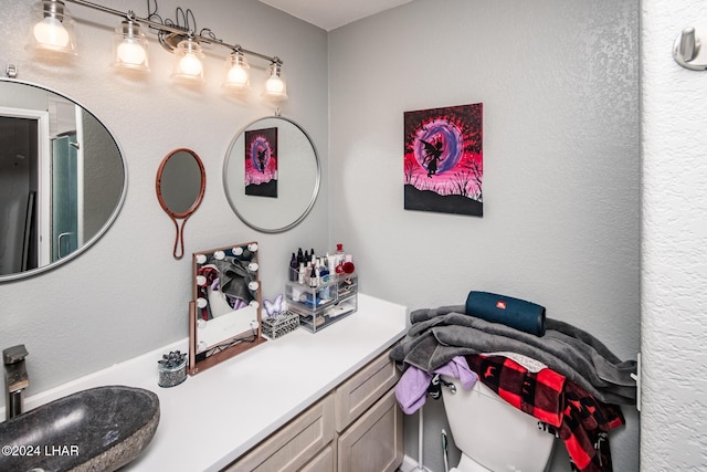 bathroom with toilet and sink