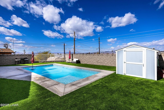 view of pool featuring a shed, a fenced backyard, a lawn, and an outdoor structure