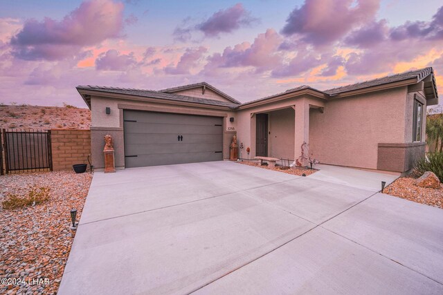 view of front of property featuring a garage