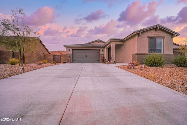 view of front of home with a garage