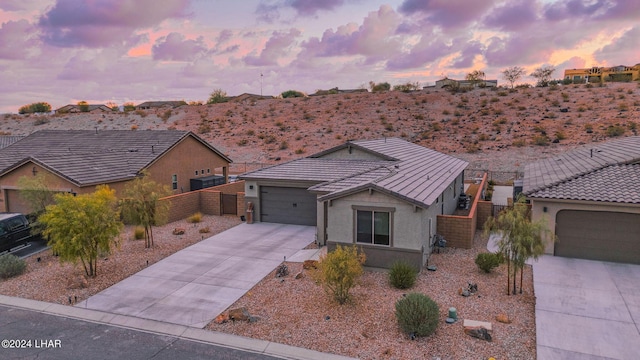 view of front of home with a garage