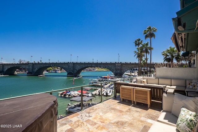 1415 Mcculloch Blvd N Unit 102, Lake Havasu City, AZ 86403 - view of patio featuring an outdoor living space and a water view
