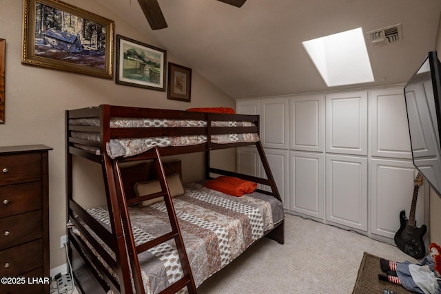 1415 Mcculloch Blvd N Unit 102, Lake Havasu City, AZ 86403 - bedroom with light colored carpet, visible vents, and lofted ceiling with skylight