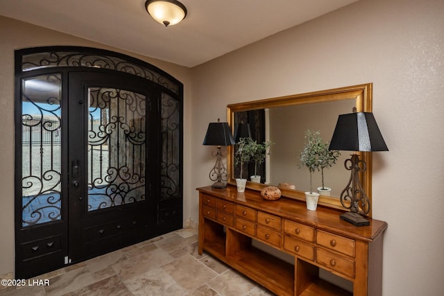 1415 Mcculloch Blvd N Unit 102, Lake Havasu City, AZ 86403 - entryway with stone finish floor and french doors