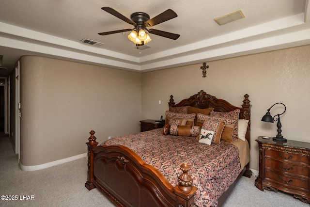 1415 Mcculloch Blvd N Unit 102, Lake Havasu City, AZ 86403 - bedroom featuring carpet floors, baseboards, a tray ceiling, and visible vents