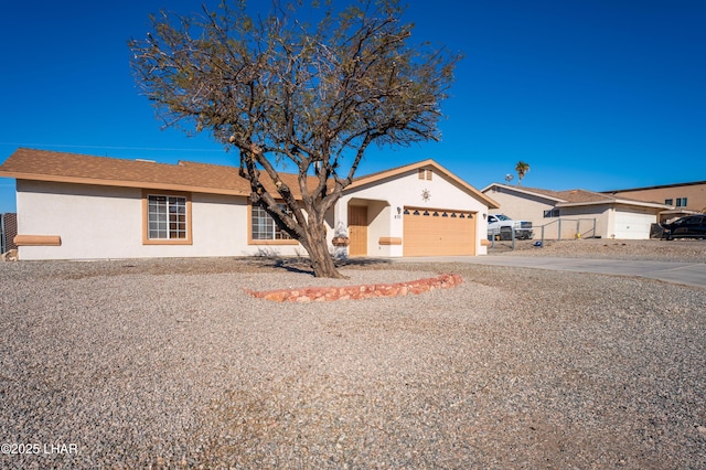 single story home with a garage