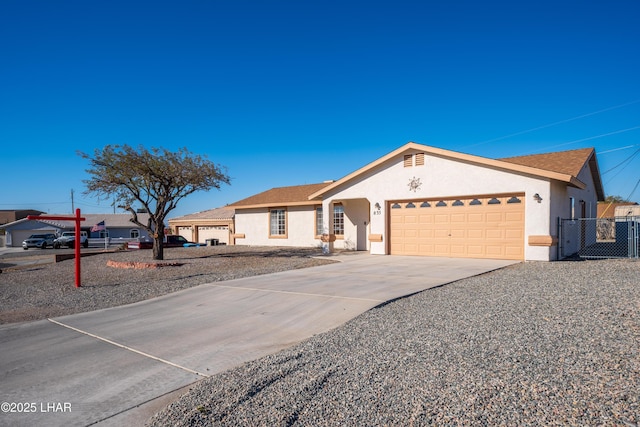 ranch-style house featuring a garage