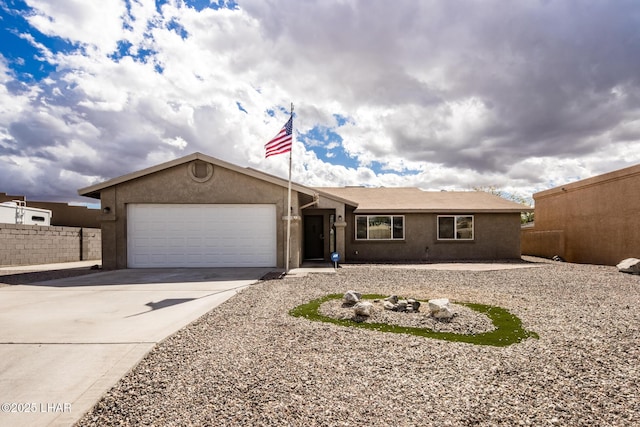 single story home with a garage