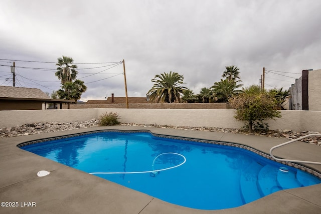 view of pool with a fenced in pool and a fenced backyard