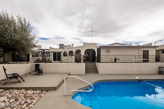 view of pool featuring a fenced in pool and fence