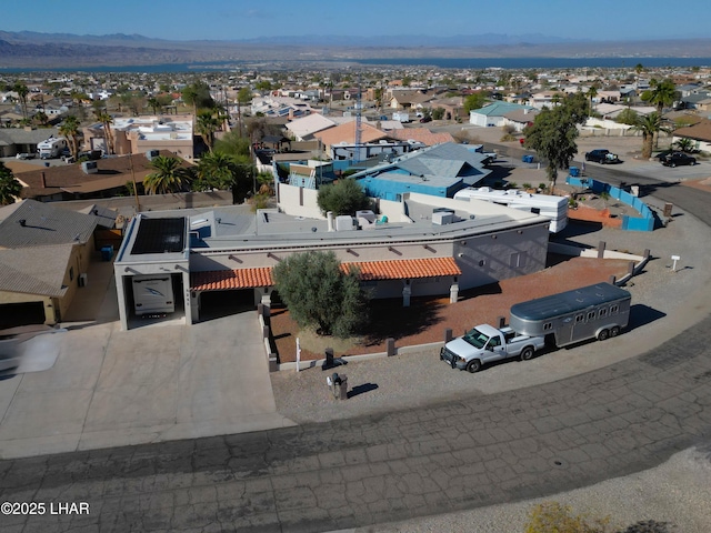 birds eye view of property featuring a residential view and a mountain view