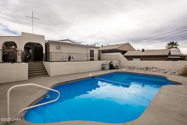 view of pool featuring a fenced in pool and a fenced backyard