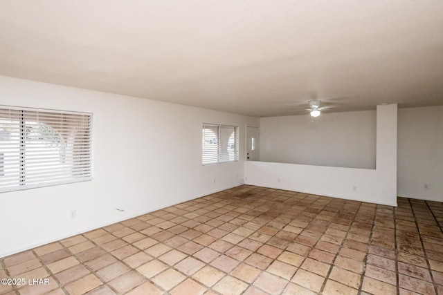 spare room featuring ceiling fan