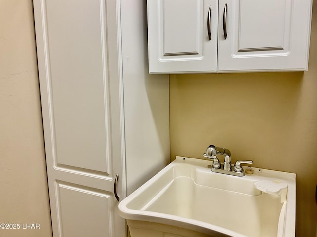 interior details featuring a sink