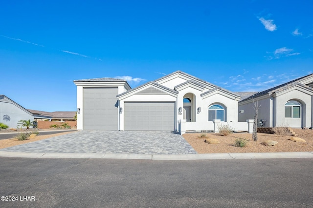 ranch-style home with a garage