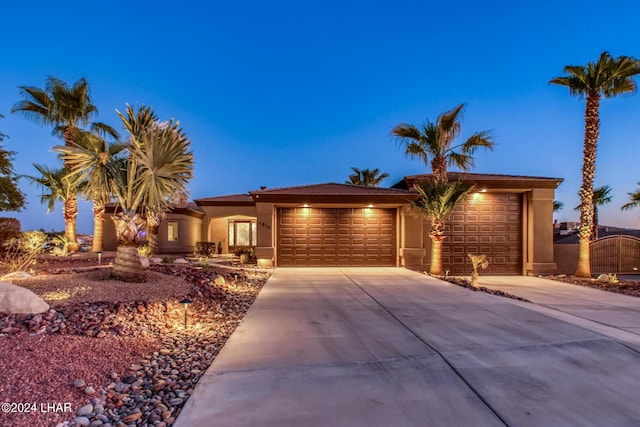 view of front of property with a garage