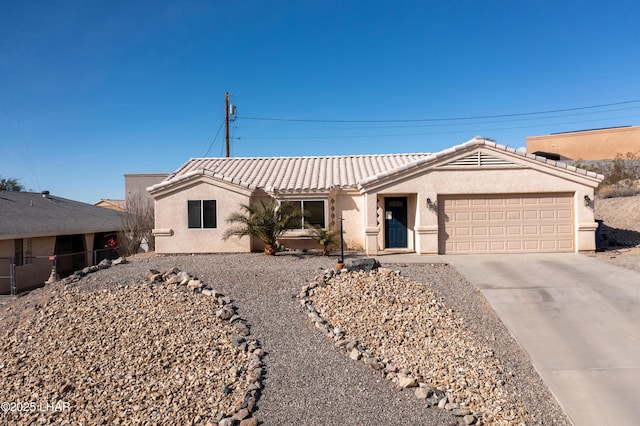 ranch-style house featuring a garage