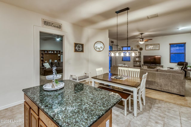 dining room with ceiling fan