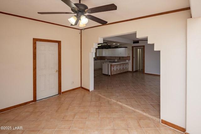 1116 W 4th St, Parker, AZ 85344 - unfurnished room with ceiling fan, ornamental molding, and light tile patterned flooring