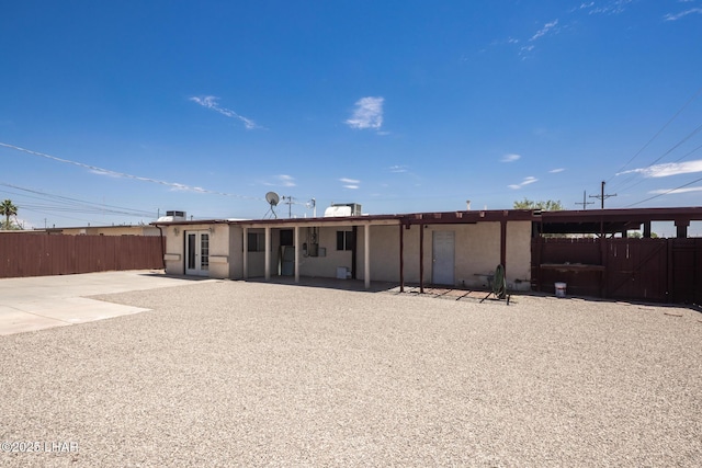1116 W 4th St, Parker, AZ 85344 - back of property with a patio and stucco siding