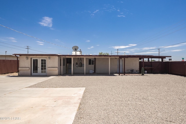 1116 W 4th St, Parker, AZ 85344 - rear view of property with french doors, stucco siding, and a patio