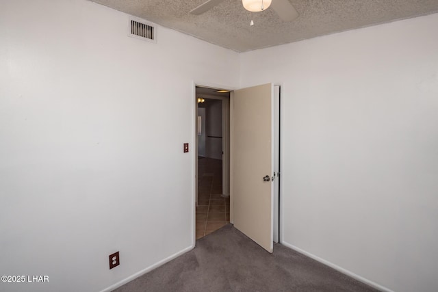 1116 W 4th St, Parker, AZ 85344 - carpeted spare room featuring ceiling fan and a textured ceiling