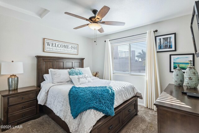 bedroom with a ceiling fan, light colored carpet, and baseboards