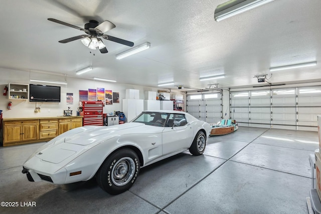 garage with ceiling fan