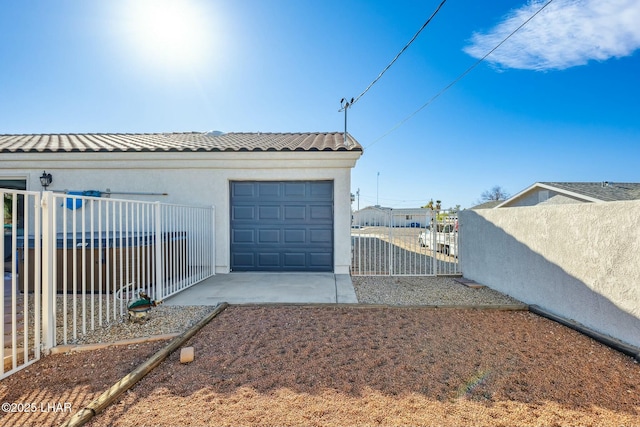 garage featuring fence