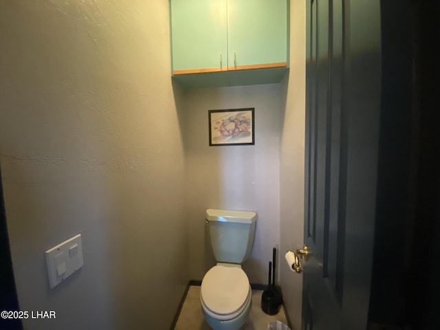 211 Columbine Dr, Lake Havasu City, AZ 86403 - bathroom with baseboards and toilet