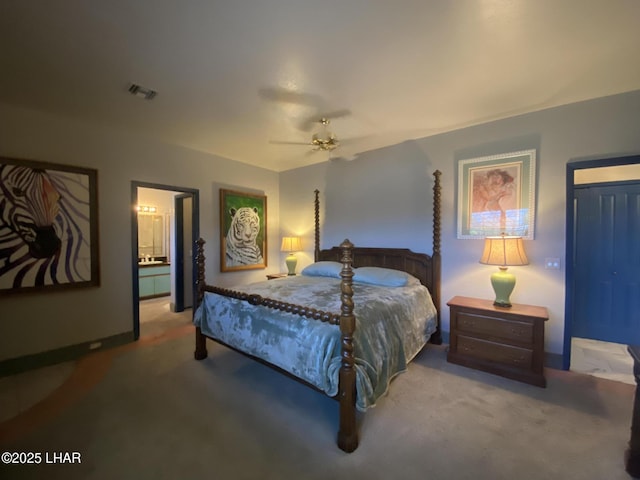 211 Columbine Dr, Lake Havasu City, AZ 86403 - carpeted bedroom with baseboards, visible vents, ceiling fan, and ensuite bath