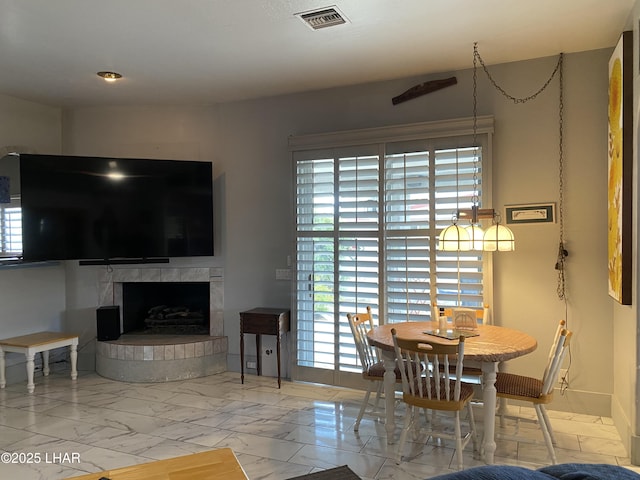 211 Columbine Dr, Lake Havasu City, AZ 86403 - dining room featuring a healthy amount of sunlight, marble finish floor, and visible vents