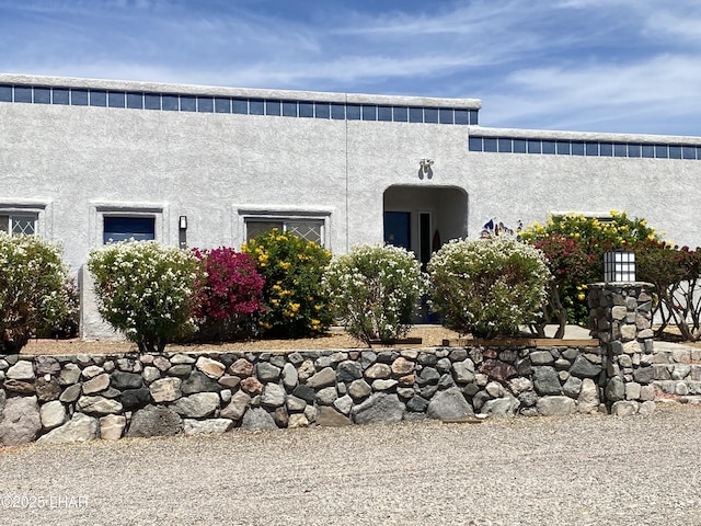211 Columbine Dr, Lake Havasu City, AZ 86403 - view of property exterior with stucco siding