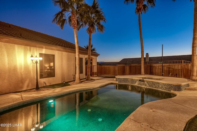 view of pool with an in ground hot tub, a patio, a fenced backyard, and a fenced in pool