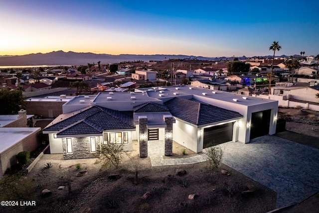 aerial view at dusk with a mountain view