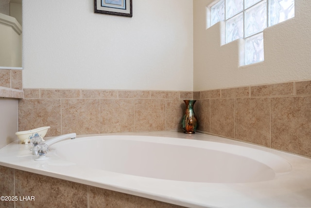 bathroom featuring a garden tub