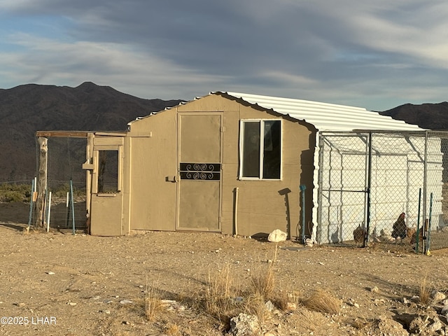 view of outdoor structure with a mountain view