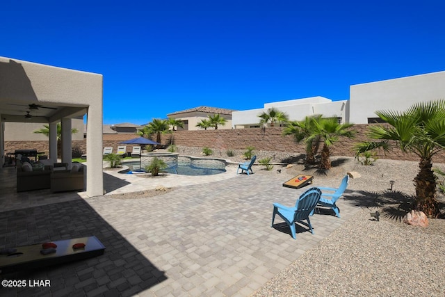 view of patio / terrace featuring a fenced backyard and a fenced in pool