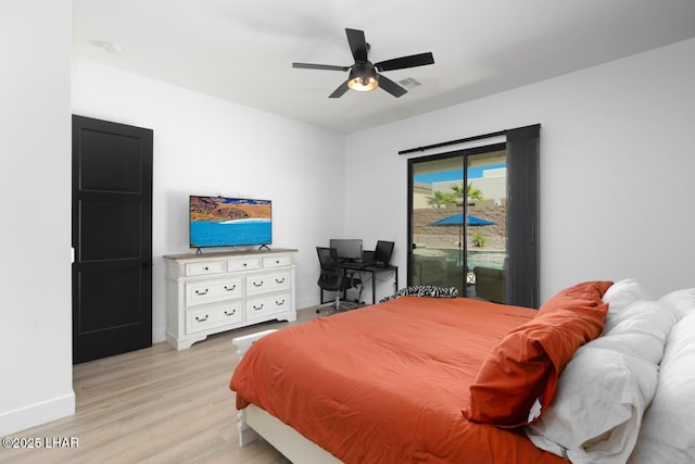 bedroom featuring access to outside, baseboards, a ceiling fan, light wood-style floors, and visible vents